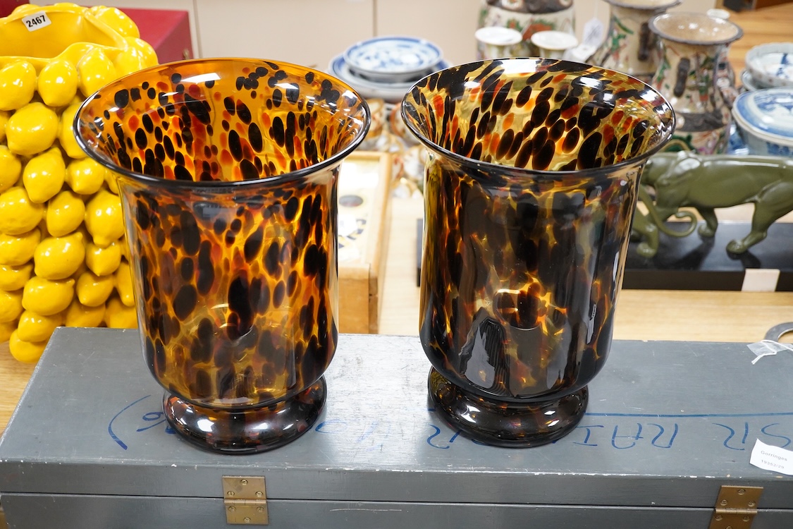 In the style of Murano, a pair of Italian hand blown ‘tortoishell’ glass vases, 31cm